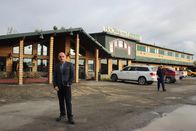 Hotel Impossible – Host Anthony Melchiorri poses outside Hooligan's Lodge in Soldotna, Alaska.