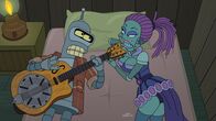 Futurama – Schon immer wollte Bender (l.) ein Folk-Star werden. Jetzt scheint der Traum in Erfüllung zu gehen. Mit einem 3D-Drucker hat er sich eine Kopie der Gitarre seines Idols Silicon Red geschaffen und hat auch schon bald in Jezabel (r.) einen ganz besonderen Fan gefunden ...