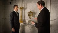 Elementary – L- R: Sherlock Holmes (Jonny Lee Miller) and Mr. Morland Holmes (John Noble)