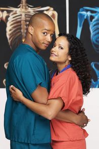 Scrubs - Die Anfänger – (2. Staffel) - Sind nicht nur Kollegen: Carla (Judy Reyes, r.) und Turk (Donald Faison, l.) ...