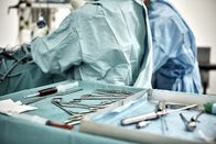 Abgründe - Unfassbare Verbrechen – Close-up of surgical equipment in tray on table against surgeons at operating room