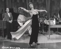 Pal Joey – Joey Evans (Frank Sinatra, l.); Vera Simpson (Rita Hayworth, r.)