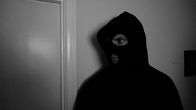 Married with Secrets – Jeff Pelo in all black with ski mask waiting outside of victims door.
