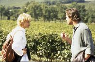 French Kiss – Zwischen dem frechen, extrovertierten Franzosen Luc (Kevin Kline, r.) und der biederen Amerikanerin Kate (Meg Ryan, l.) herrscht Antipathie auf den ersten Blick ...