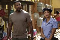 Falcon Rising – John "Falcon" Chapman (Michael Jai White, l.); Katarina (Millie Ruperto, r.)