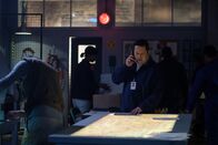 Mayday - Alarm im Cockpit – A Nepalese investigator (played by Leon Aureus) investigates a topographical map of the Himalayan Mountains in order to understand Pakistan International Airlines Flight 268's tragic accident. (Cineflix 2018/Darren Goldstein)