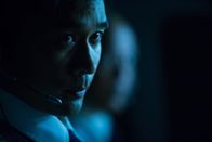 Mayday - Alarm im Cockpit – REENACTMENT - First Officer Hamid (played by Adriano Sobretodo Jr.) looks out the window of the cockpit of Malaysia Airlines Flight 370. The Boeing 777 disappeared under mysterious circumstances on March 8, 2014 along with all 239 people on board. (photo credit: Cineflix/Darren Goldstein)