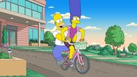 Die Simpsons – Homer (l.); Marge (r.)