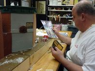 Cake Boss: Buddys Tortenwelt – Sesame Street Cake. Mauro works on constructing the exterior buildings of the Sesame St cake.