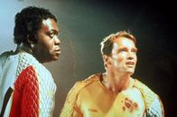 Running Man – William Laughlin (Yaphet Kotto, l.); Ben Richards (Arnold Schwarzenegger, r.)