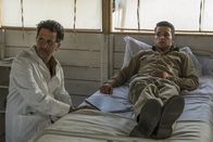 Catch-22 – Young American flyers arrive in war and discover that the bureaucracy is more deadly than the enemy. Doc Daneeka (Grant Heslov) and Yossarian (Christopher Abbott), shown. (Photo by: Philippe Antonello/Hulu)