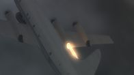 Mayday - Alarm im Cockpit – View from above of United States Department of Commerce jet flying through the sky with right engine on fire.