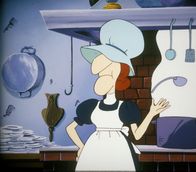 Alice im Wunderland – Die Köchin der Herzogin wirft den Löffel weg. Sie kündigt, da sie sich schlecht behandelt fühlt.