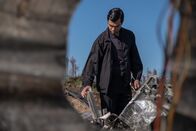 Mayday - Alarm im Cockpit – REENACTMENT - The Main Investigator (played by RJ Parrish) surveys and analyzes the wreckage left from US-Bangla Airlines Flight 211. (Cineflix 2020/Darren Goldstein)