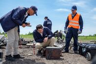 Mayday - Alarm im Cockpit – JIAAC Investigator Augusto De Santis (played by John Philip Vazquez) examines the black box of downed SOL Lineas Aerias Flight 5428. (Cineflix 2019/Darren Goldstein)