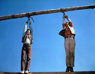 Die Comancheros – Paul Regret (Stuart Whitman, l.); Capt. Jake Cutter (John Wayne, r.)