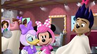 Micky Maus Wunderhaus – On left: Daisy Duck, in middle: Minnie Mouse