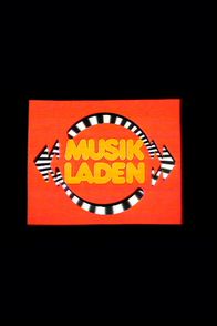 Musikladen – rbb Fernsehen MUSIKLADEN, "Präsentiert von Manfred Sexauer und Uschi Nerke" Uhr. Logo der Sendung.