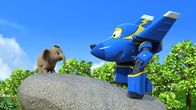 Super Wings – Jerome will den kleinen Elefanten vom Felsen locken.