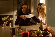 The Hunt – L-R: Athena (Hilary Swank), Crystal (Betty Gilpin)