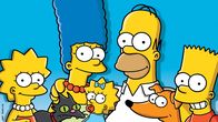 Die Simpsons – L-R: Lisa, Snowball, Marge, Maggie, Homer, Santa's Little Helper, Bart