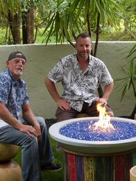 Die Beckenbauer - Pools der Superlative – John Old Man Messner und Lucas Congdon sit by the completed fire pit.