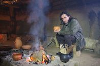 Die Wikinger – Neil samples a winter drink in the reconstruction of a Bronze Age longhouse, at Borum Eshoj in Denmark.