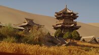 Mythos Seidenstraße – Tempelanlage in einer Oase, umgeben von den „singenden Dünen“, einem Naturphänomen. Von Dunhuang aus brachen die Händler der Seidenstraße in die Taklamakan-Wüste auf.