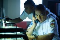 Mayday - Alarm im Cockpit – KNKT Investigators Ray Nurcahyo (played by Von Flores) and Ony Wibowo (played by Josh Barilko) get a call from the crash site of Trigana Service Flight 267. (Cineflix 2018/Darren Goldstein)