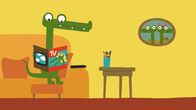 Animanimals – Das Krokodil studiert das Programm.