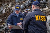 Mayday - Alarm im Cockpit – REENACTMENT - The Lead NTSB Investigator (played by Brendan Wall) reviews his wreckage notes at the crash site of Execuflight 1526. (Cineflix 2020/Darren Goldstein)