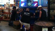 Die Aquarium-Profis – Wayde and Redneck working on the bottom half of the fish tank.