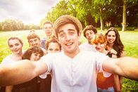 Big Stories – Group of teenager people making selfie portrait in sunny day