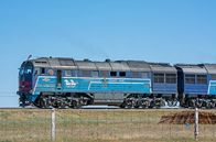 Mit dem Zug ... – Güterzug in der mongolischen Steppe.