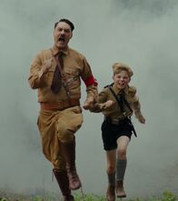 Jojo Rabbit – L-R: Adolf (Taika Waititi), Jojo (Roman Griffin Davis)