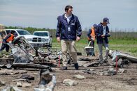 Mayday - Alarm im Cockpit – JIAAC Investigator Augusto De Santis (played by John Philip Vazquez) walks amidst the debris of the destroyed Saab 340-A of SOL Lineas Aerias Flight 5428. (Cineflix 2019/Darren Goldstein)