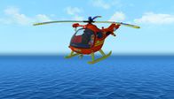 Feuerwehrmann Sam – Tom Thomas fliegt in Wallaby 1 über den Strand von Pontypandy.