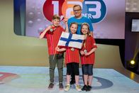 1, 2 oder 3 – Das Rateteam aus Turku/Finnland mit Elton und der Finnland-Flagge.