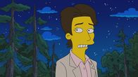 Die Simpsons – Lang, lang ist's her: Kent Brockman hätte in seiner Jugend die Möglichkeit gehabt, ins weltweite Nachrichtengeschäft einzusteigen, doch Bequemlichkeit hielt ihn bei seinem kleinen Lokalsender fest. Hätte er damals doch nur anders entschieden ...