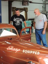 Fast N' Loud – Richard Rawlings (l.) and Ed Foster stand next to the 1930 Ford Model A Bonneville Racer.