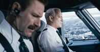 Sully – L-R: Jeff Skiles (Aaron Eckhart), Chesley 'Sully' Sullenberger (Tom Hanks).