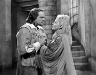 Die drei Musketiere – Lady de Winter (Lana Turner) fleht um Vergebung für ihre Verbrechen - doch Athos (Van Heflin) verweigert ihr dies. Zu oft schon wurde sie begnadigt, um schließlich doch nur böse Taten folgen zu lassen.