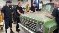 Fast N' Loud – Chris Emfield, Jason Aker, K.C Mathieu and Mike Coy hover over the 1976 Chevy Silverado C-10 planning their next move.