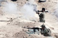 Irak im Kreuzfeuer – Ein Trainingscamp für Milizionäre – die Volksmobilmachungskräfte sollten ursprünglich nur eine begrenzte Zeit existieren, wollen sich jedoch nach dem Sieg über den Islamischen Staat nicht entwaffnen lassen.
