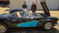 Fast N' Loud – Richard Rawlings and Keith Hagan talk next to the open hood of the '58 Corvette.