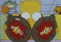 Die Simpsons – Bart studiert die "Horror-Speisekarte" in Itchy und Scratchy Land.