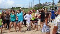 Hotel Impossible – Anthony dances with a flash mob of dancers at Baby Beach, as seen on Travel Channel's Hotel Impossible.