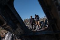 Mayday - Alarm im Cockpit – REENACTMENT - The Main Investigator (played by RJ Parrish) surveys the crash site of US-Bangla Airlines Flight 211, while another investigator documents the wreckage. (Cineflix 2020/Darren Goldstein)
