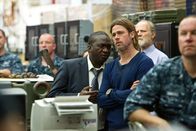 World War Z – Fana Mokoena (Thierry Umutuni), Brad Pitt (Gerry Lane).