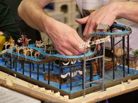 Die Modellbauer - Das Miniatur Wunderland – Model maker Felix is installing a ship with pirate skeletons on the Grund.